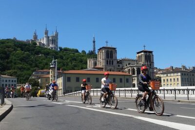 2h - Electric Bike Tour of Lyon with a Local Guide - Riding the Rhône Banks on Bike-Only Path: A Rare Easy Stint