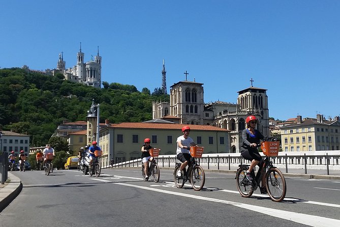 2h - Electric Bike Tour of Lyon with a Local Guide - Riding the Rhône Banks on Bike-Only Path: A Rare Easy Stint
