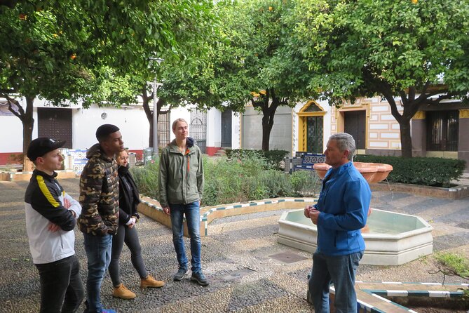 3-hour Guided Bike Tour along the Highlights of Seville - Plaza de España: ceramics, symmetry, and a photo window