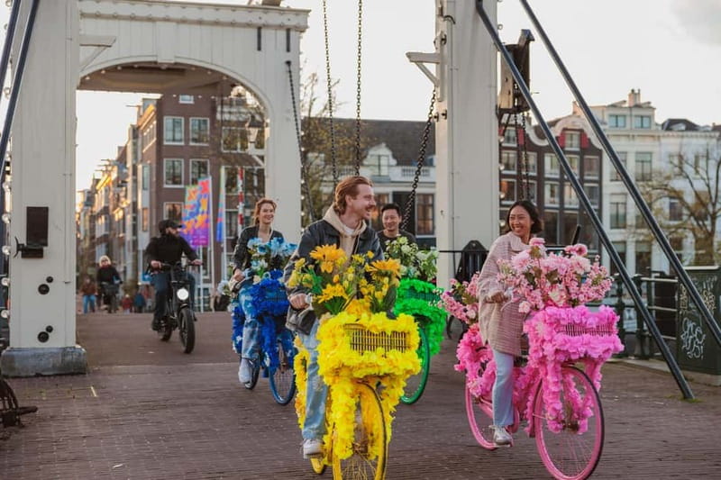 Amsterdam: City Centre, Guided Bike Tour on Flower Bikes - Starting point and first minutes: Nieuwezijds Voorburgwal to the Jordaan