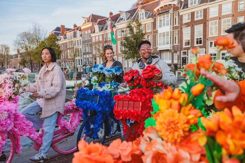 Amsterdam: City Centre, Guided Bike Tour on Flower Bikes - Anne Frank House from the bike: a pause that hits