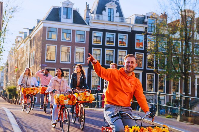 Amsterdam City Top Highlights Guided Bike Tour - Meeting at Nieuwezijds Voorburgwal: get fitted and get rolling