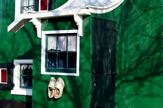 Amsterdam E Bike Tour to the Windmills of Zaanse Schans - Zaanse Schans: where the windmills, cheese, and clogs take over