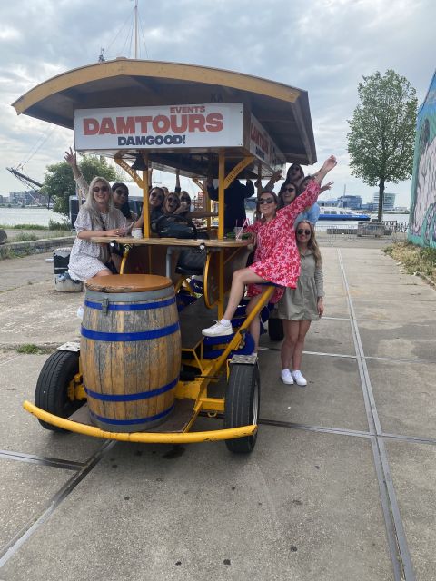 Amsterdam: Guided Beer Bike or Prosecco Bike Tour - What Happens During the 85-Minute Ride
