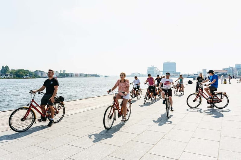Amsterdam: Guided Bike Tour City Centre in EN/DE/FR/ES - Westerkerk, Anne Frank Area, and Leidseplein’s Street Energy
