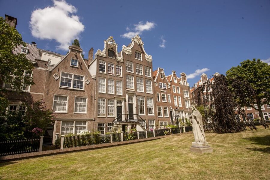 Amsterdam: Hidden Gems & Highlights Guided Bike Tour - Vondelpark by bike: Amsterdam’s green, reached without detours