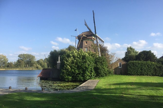 Amsterdam Landscape Windmill Private Bike Tour - Stop-by-stop: windmills, castles, canals, and defense-line history