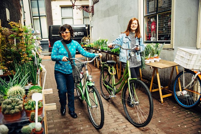 Amsterdam PRIVATE Bike Tour With Locals: Bike & Local Snack Included - Snack or Drink Included: Small Stop, Real Momentum