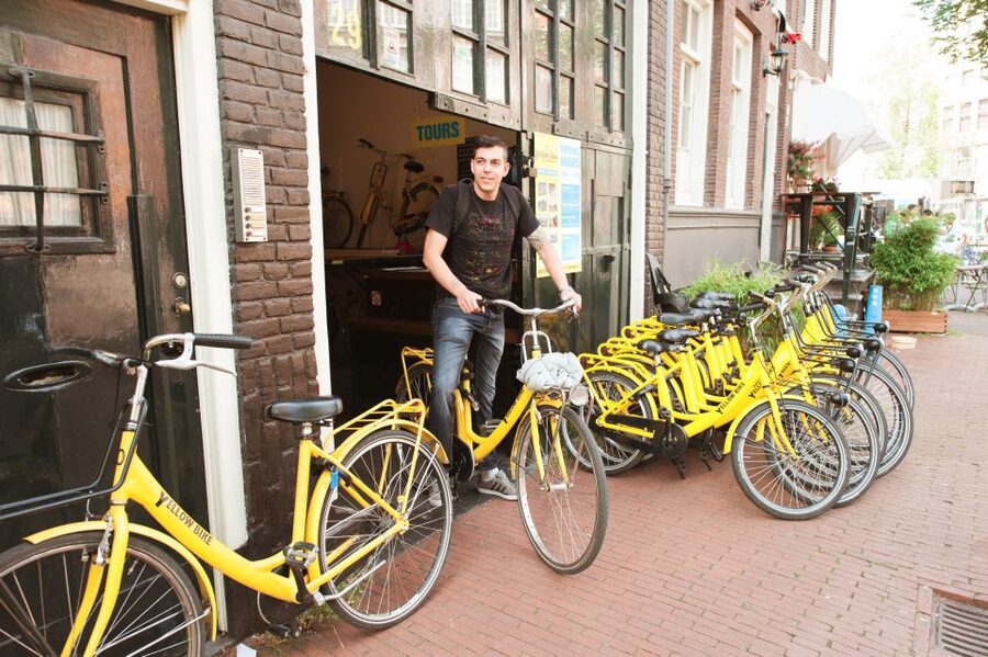 Amsterdam: Relaxed City Highlights Guided Bike Tour - Museumplein and the Fashion Street Walk-By Energy