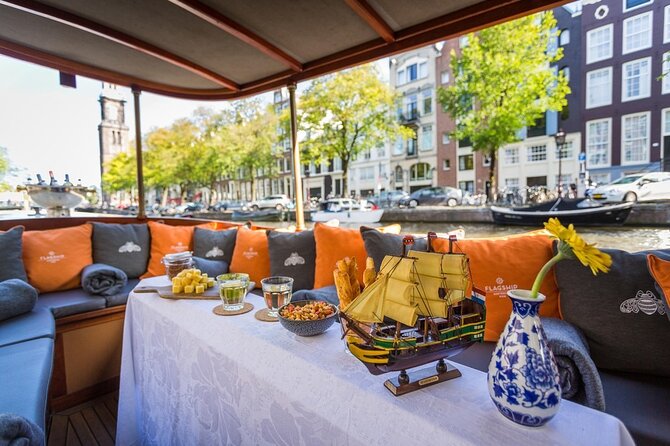 Amsterdam Small-Group Bike Tour With Canal Cruise, Drinks, Cheese - Parks and the Jordaan: Bike Through Real Neighborhood Amsterdam