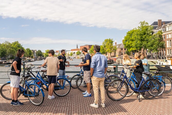 Amsterdam Small-Group Bike Tour With Optional Canal Cruise - De Gooyer Windmill, ARTIS, and the narrow bridge that shows up on film