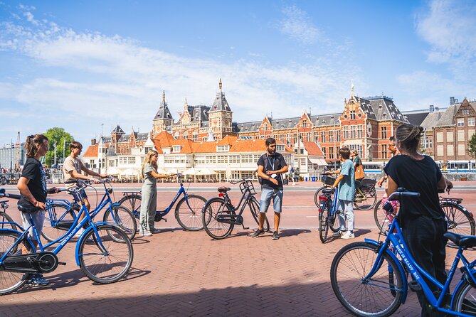 Amsterdam Small-Group Bike Tour With Optional Canal Cruise - Price and value: $30.25 for a guide, a bike, and real sightings