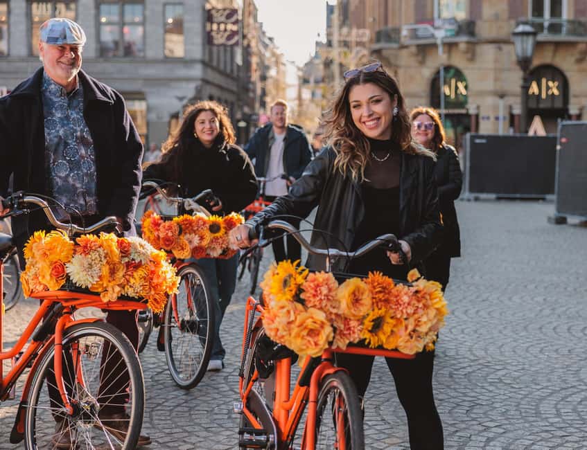 Amsterdam: Top Highlights Guided Bike Tour - Price and Value: Getting Real Sightseeing for $23