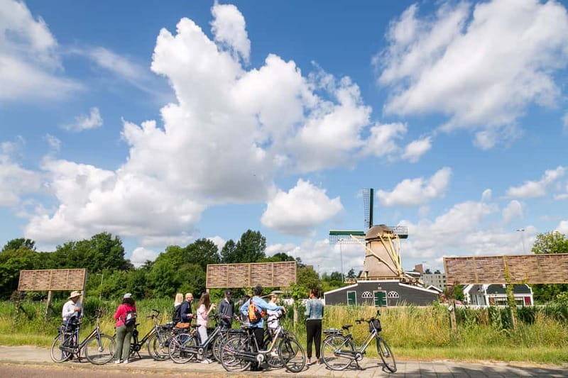Amsterdam: Windmill, Cheese, and Countryside E-Bike Tour - Ferry views, windmill photos, and small-group care