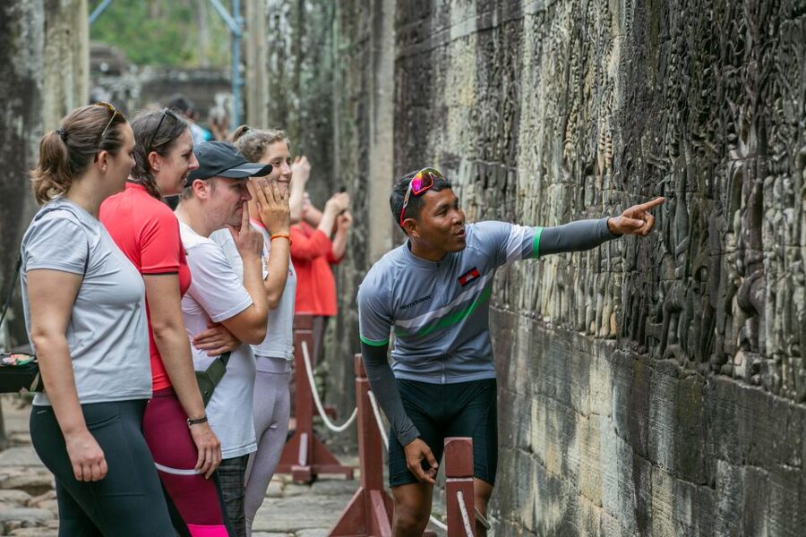 Angkor Wat: Guided Sunrise Bike Tour w/ Breakfast and Lunch - Cycling behind Angkor Wat: quieter paths and real heat