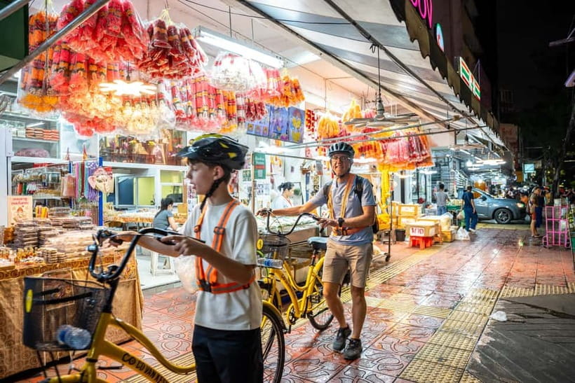 Bangkok by Night Cycling Tour with Street-food Meal - Flower market under lights: why the night version feels special