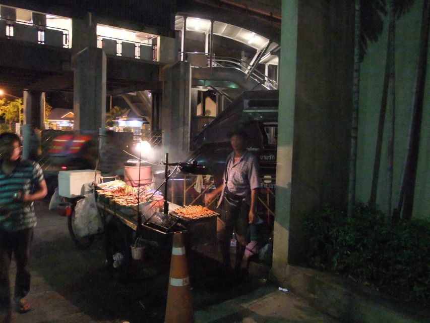 Bangkok by Night Cycling Tour with Street-food Meal - The ferry crossing: a quick break from traffic and a photo-friendly pause