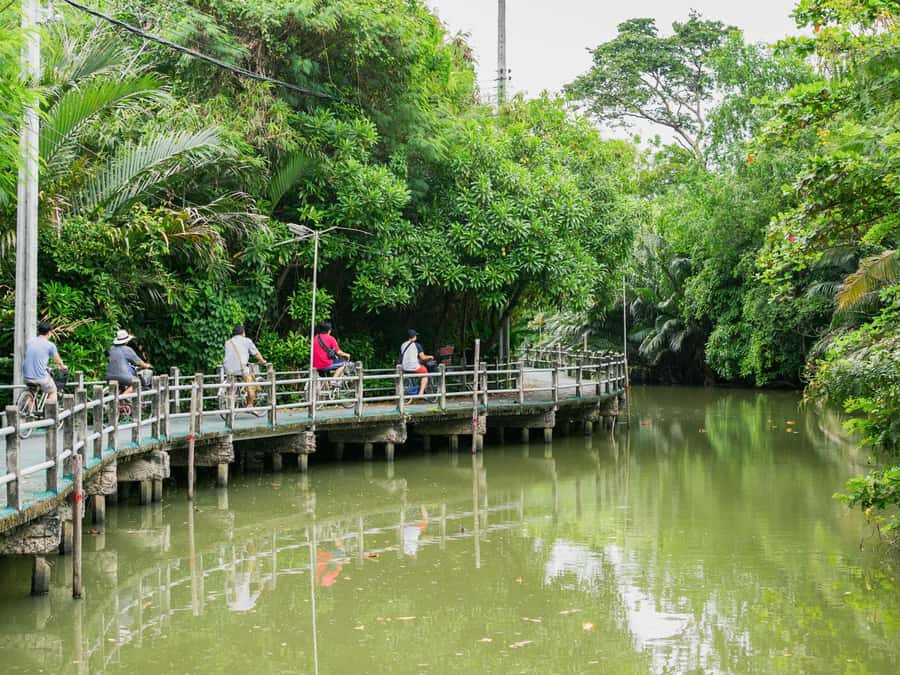 Bangkok: Khlong Toei Market & Bang Krachao Island Bike Tour - Price and value: $83 for a full half-day of transport and extras