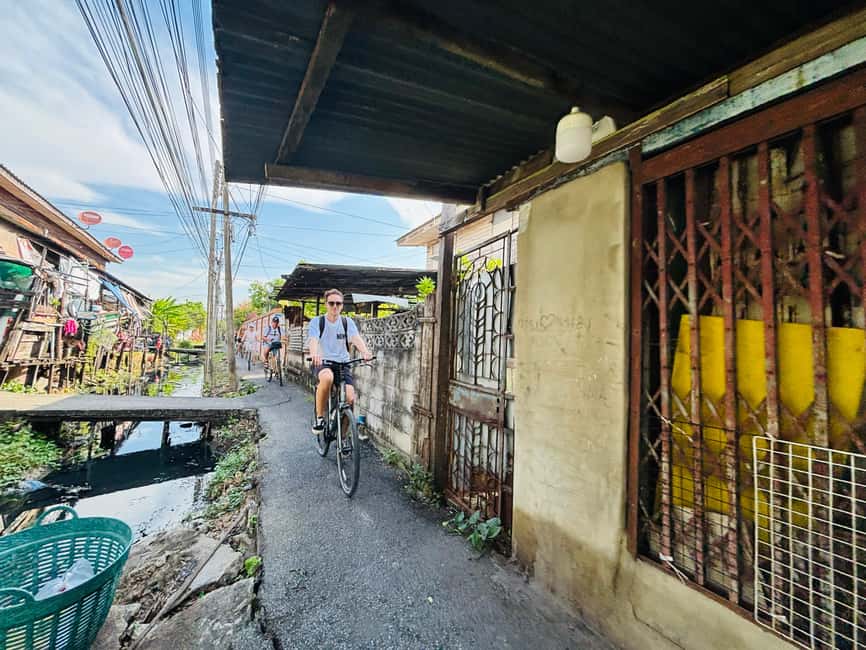 Bangkok: Temples, Canals & Local Life Bike Tour - Talat Phlu (Phlu Market): the river-era neighborhood vibe