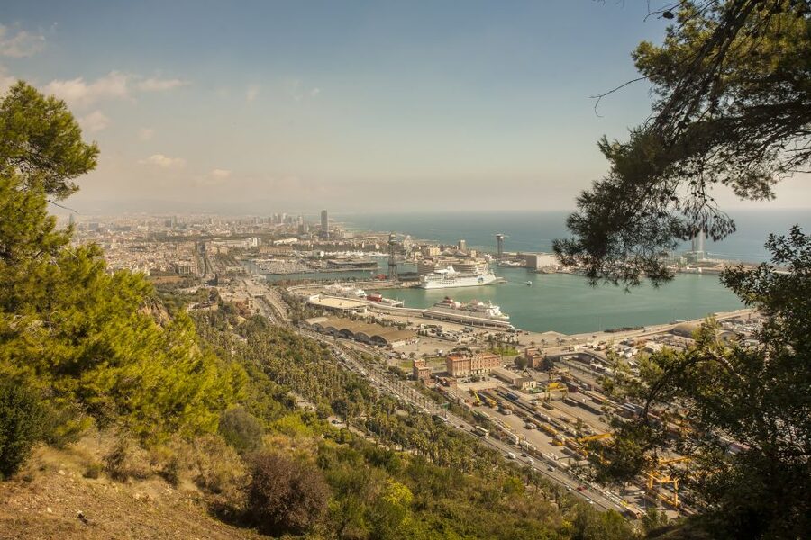 Barcelona: E-Bike Tour with Montjuic Cable Car & Boat Ride - E-bikes, terrain, and guide pacing: what to know before you book