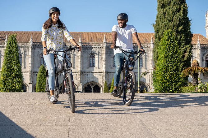 Belém E-Bike Guided Tour Explore Lisbon by the river - Ribeira das Naus: a river beach vibe for resting your legs (even though swimming is off-limits)