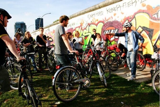 Berlin: Guided Bike tour of the Berlin Wall and Third Reich - Stop 1: Nikolaiviertel, Berlin’s old core, with a blunt question about how it survived