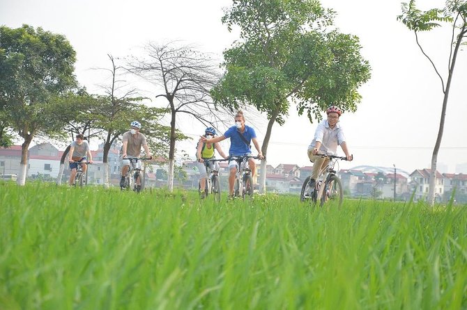 Bicycle Tours Hanoi: Full Day Bicycle Tours City & Countryside - The Reunification train track: riding alongside a living rail line