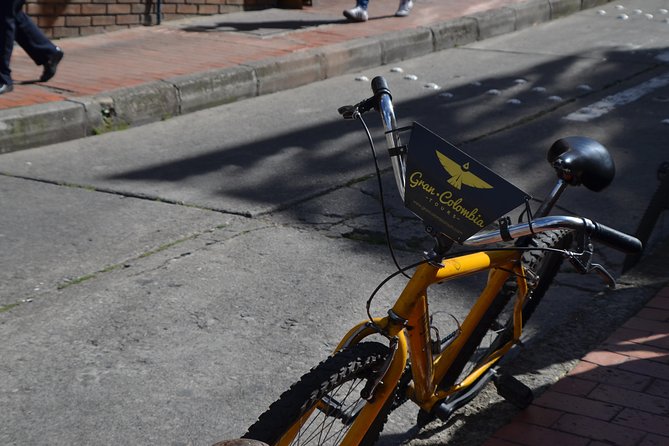 Bogotá Private Bike Tour with Transportation - La Candelaria: founding plazas and a salt road turned avenue