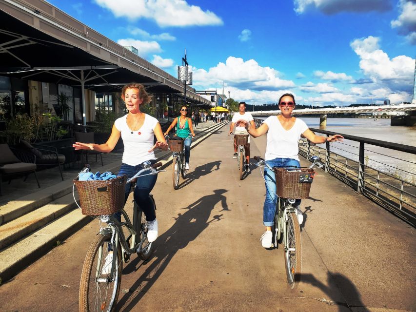 Bordeaux: Top Landmarks & Historic Bike Tour - Notre Dame Street, cobbled lanes, and café plazas: where the city feels lived-in