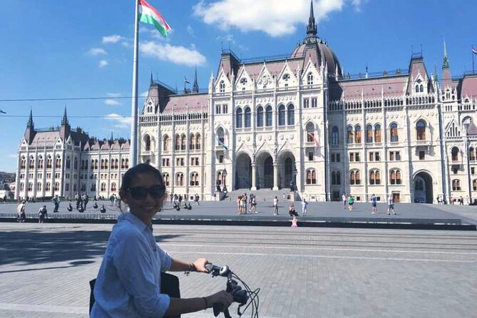 Budapest Highlights Bike Tour with a local guide - House of Terror, St. Stephen’s Basilica, and Szabadság Square: mood shifts on purpose
