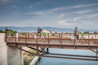 Cagliari E-Bike Tour: Gulf, Canals & Flamingos at Molentargius - Meeting at the bike shop and rolling from the harbor