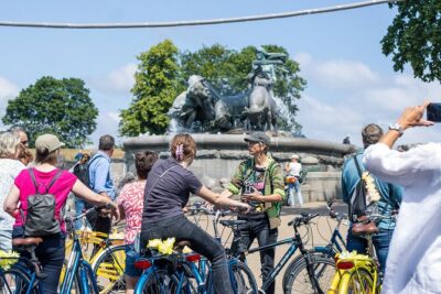 Copenhagen Highlights 3 Hour Bike Tour with local Guide - Radhuspladsen to Christiansborg: Town Hall Square to the Royal stables