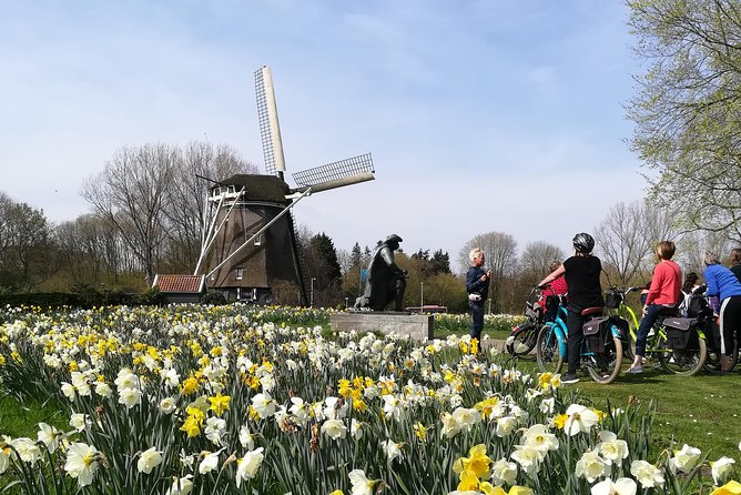 Countryside Bike Tour from Amsterdam: Cheese, Clogs & a Windmill - Waterland Countryside: Flat Roads, Canal Lines, and Wide Sky