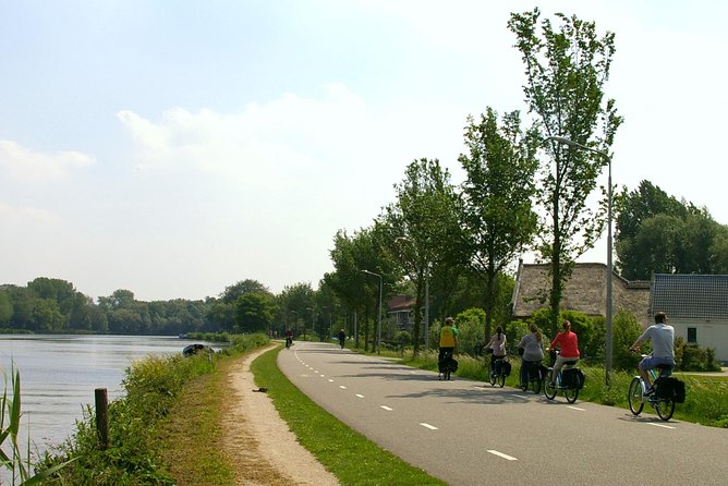 Countryside Bike Tour from Amsterdam: Cheese, Clogs & a Windmill - Broek in Waterland: Wooden Houses and Calm Canals