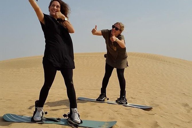 Dubai Desert Morning Tour in 4WD Vehicle: Camel Ride, Quad Bike Tour, Sandboarding, and Camel Farm - Key highlights from this desert-morning mix