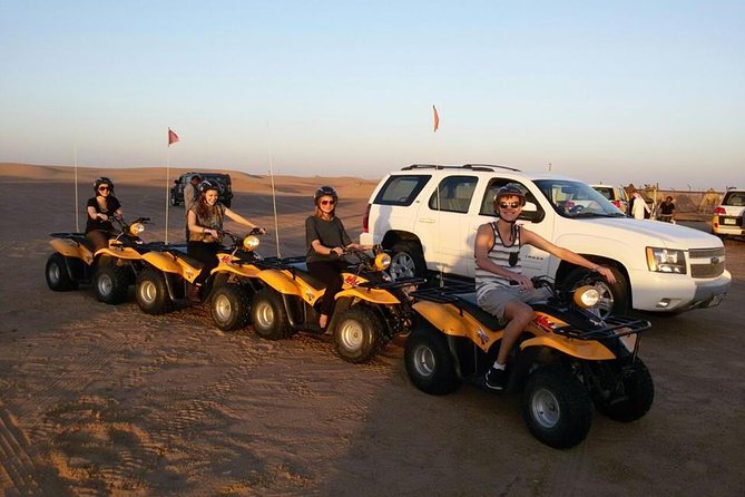 Dubai Desert Morning Tour in 4WD Vehicle: Camel Ride, Quad Bike Tour, Sandboarding, and Camel Farm - Camel farm stop: the photos are the point, not a full-scale attraction