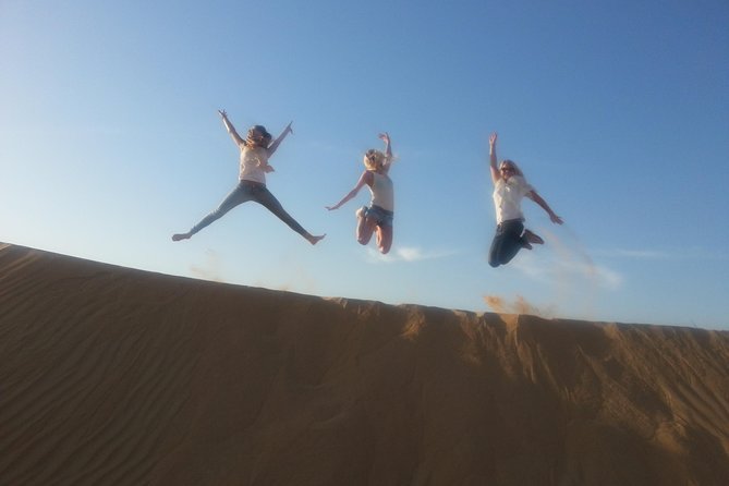 Dubai Desert Morning Tour in 4WD Vehicle: Camel Ride, Quad Bike Tour, Sandboarding, and Camel Farm - Sandboarding down the dunes: the adrenaline part you’ll remember