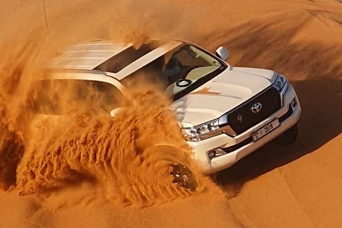Dubai: Jeep Desert Safari, Camel Ride, and Quad Bike Tour - Sandboarding: the fun pause between the fast rides