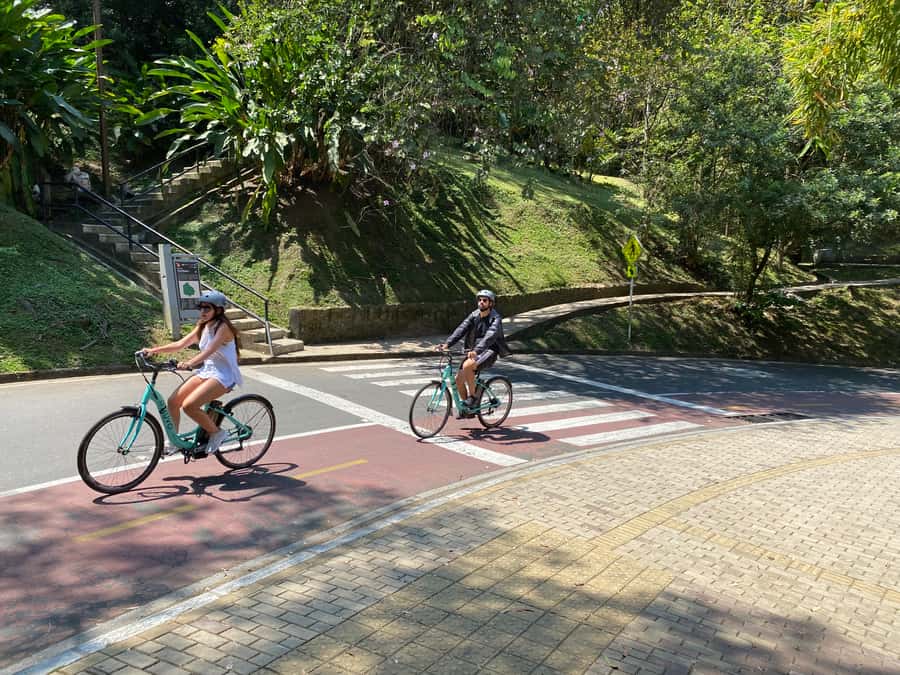 E-Bike City Tour Medellin with Local beer and Snacks - The extra 30-minute guided stop: stadium and lights energy