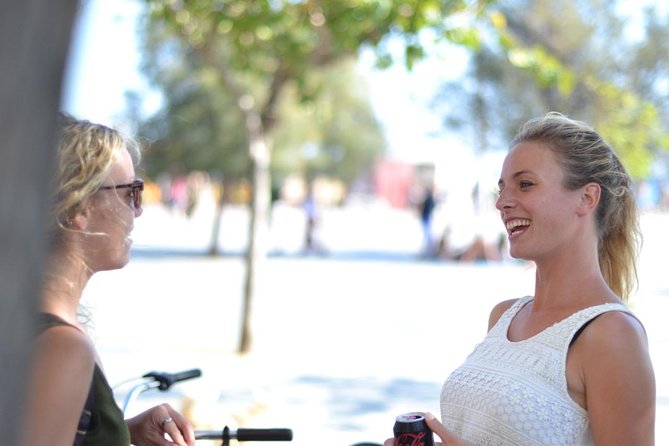 E-Bike tour in Barcelona with English Guide - Meeting at Carrer d’Enric Granados 5: bikes, helmets, and quick safety basics
