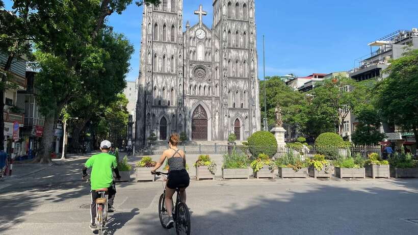 Explore Hanoi Old City By Cycling Tour With Small Groups - Hanoi Old Quarter lanes, Dong Xuan Market, Cua Bac gate, and Hanoi Church