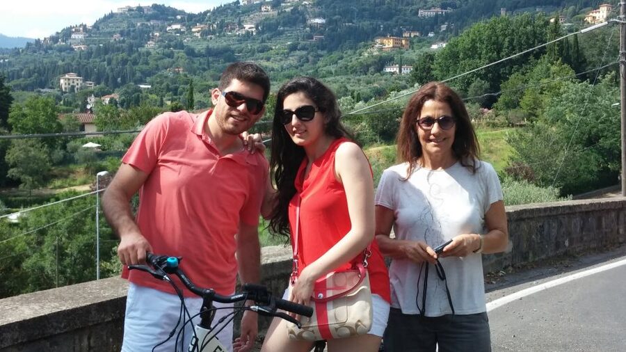 Florence: Guided Electric Bike Tour with Gelato - Descending toward the city: Lungarno streets and the Florence you know