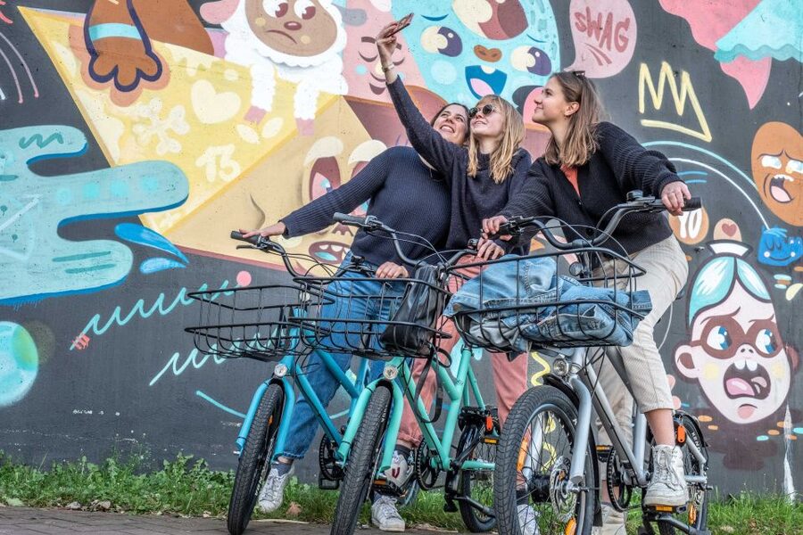 Ghent: City Highlights and Hidden Gems Guided Bike Tour - Weather: rain or shine, with the right backup