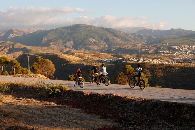Granada: Alhambra and Sierra Nevada Sunset Views by E-Bike - Stop 4: Sacromonte Cave Houses and Flamenco Traditions