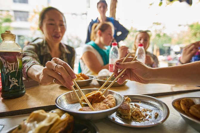 Half-Day Bike Tour of Shanghai Old Town with Food Tasting - Safety brief first, then an easy pace through old streets