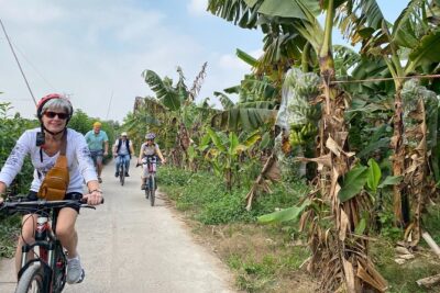 Hanoi City Bike Tour through Banana Island & Food Tasting - Stop 1: Long Bien Bridge and why riding it changes everything