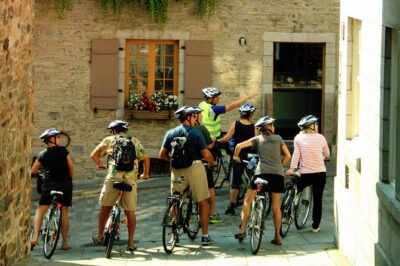 Historical Lower Town & Neighborhoods Bike Tour - Place de la FAO: the warm-up streets before the big landmarks