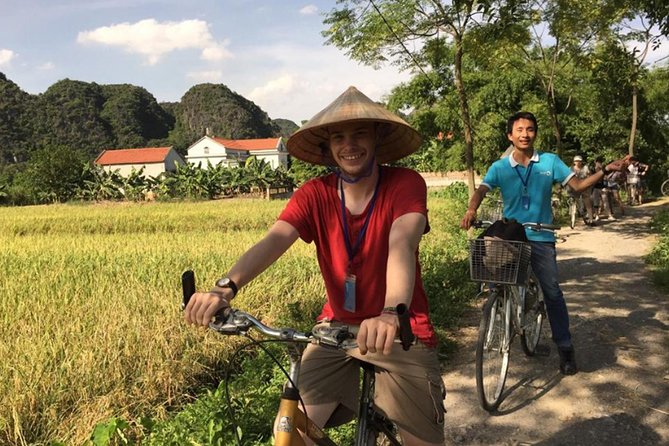 Hoa Lu - Tam Coc: Boat Trip and Bicycle Ride - Guide Energy: When Kimi Makes the Day Feel Lighter