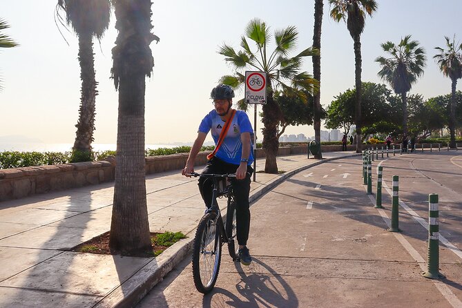 Lima Bike Tour in Miraflores & Barranco - Shared small group - Miraflores Highlights: Parque Kennedy, Parque del Amor, Larcomar Cliffs, and Costa Verde Views