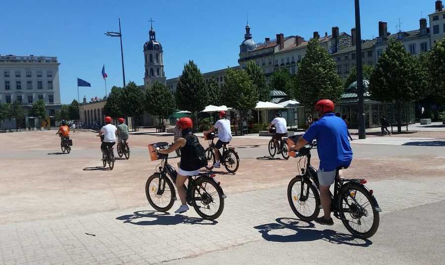 Lyon: 2-Hour Electric Bike Tour with a Local Guide - Place Bellecour and Place des Terreaux: squares that feel like living rooms
